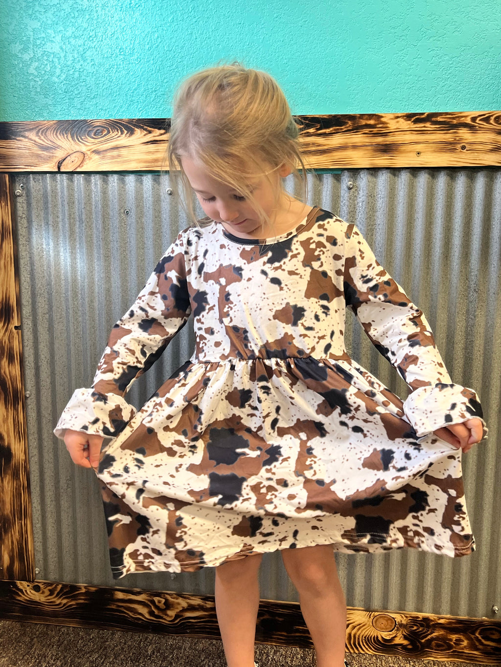 cow print dress Mini Dress, Vegan Fake Fur, Plus Sizes This playful cotton blend dress features a fun cow print paired with a flattering boat neckline and a flirty peplum hemline Mesh Cut Out Cow Print